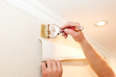Pose de papier peint au Passage — revêtements muraux et toiles de verre